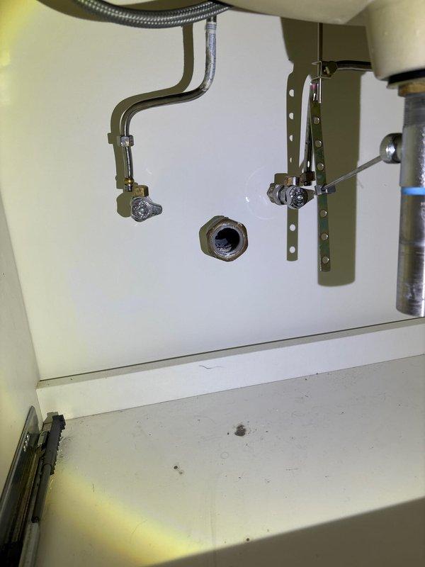 Successfully reconnected water supply lines to customer's sink, ensuring proper installation of all plumbing components including supply valve, drainage assembly, and mounting hardware. Visual inspection confirmed no leaks and full functionality of the system.