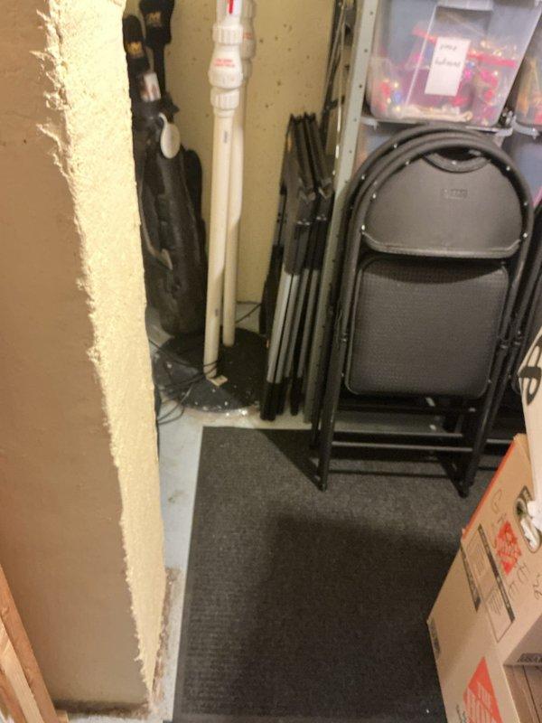 Performed comprehensive inspection of residential sewer system, sump pump, and ejector pit as requested by homeowner due to foul odor present since November 2025. Visual assessment revealed potential water intrusion issues in storage area with damaged drywall and a floor drain showing signs of previous moisture. System was last inspected in 2015 prior to major repairs, with additional foundation and drain tile work completed by Goode in 2020.