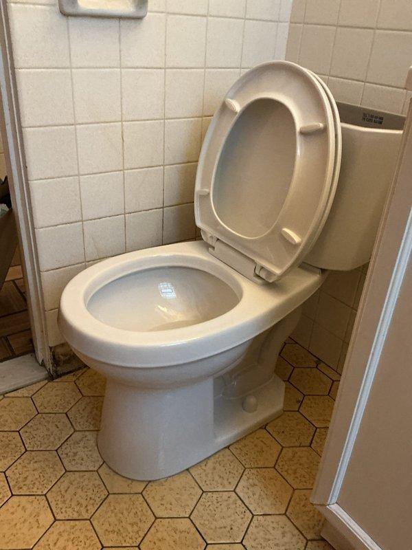 Replaced faulty wax seal on second floor apartment toilet and cleared blockage in the drain line below. Confirmed proper function after repair with successful test flush and no signs of leakage around toilet base.