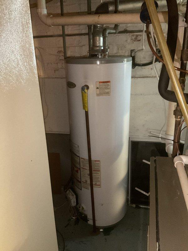 Responded to service call for tanked water heater with intermittent pilot light issues. Upon inspection, discovered and cleaned debris from thermocouple and pilot assembly. Verified proper gas supply and ventilation. After servicing, tested unit through multiple heating cycles, confirming stable pilot light operation and proper burner ignition. Unit now functioning correctly with all safety systems operational.