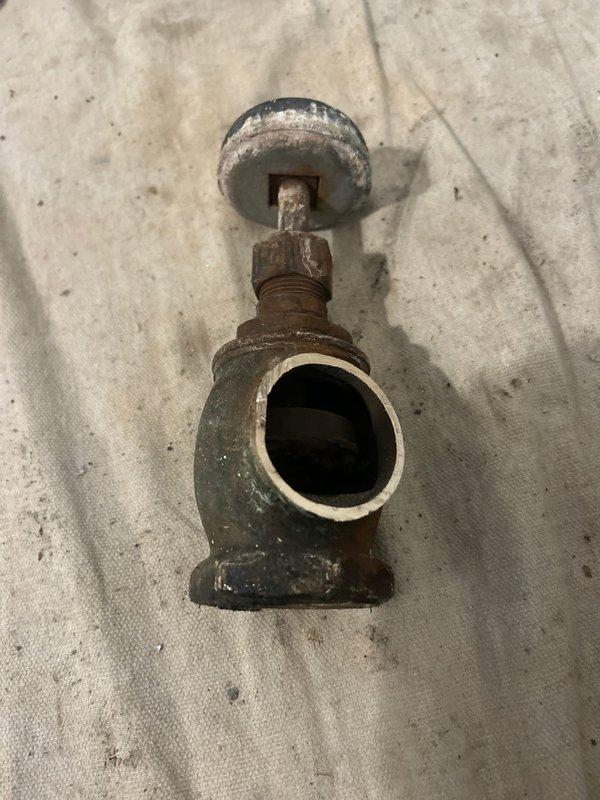 Removed and replaced customer-supplied radiator valve, which had significant corrosion and mineral buildup in the valve body. Disassembled and inspected internal components including screen and flow regulator to ensure proper installation and function.