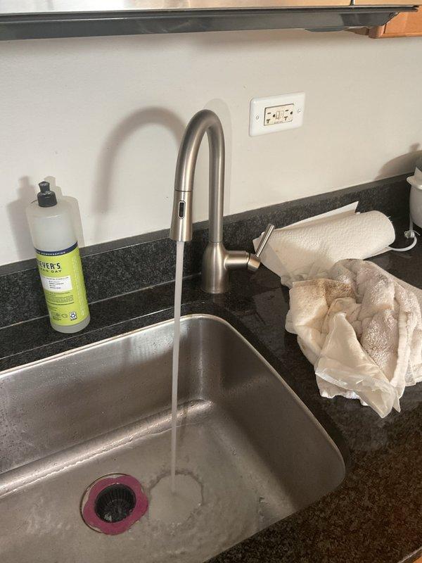 Completed scheduled building shutdown to address cold temperature issues. Successfully restored proper water flow to kitchen sink faucet, verifying functionality of pull-down sprayer and checking for leaks. Inspected garbage disposal unit and drain system connections, confirming all plumbing components are properly secured and operational.