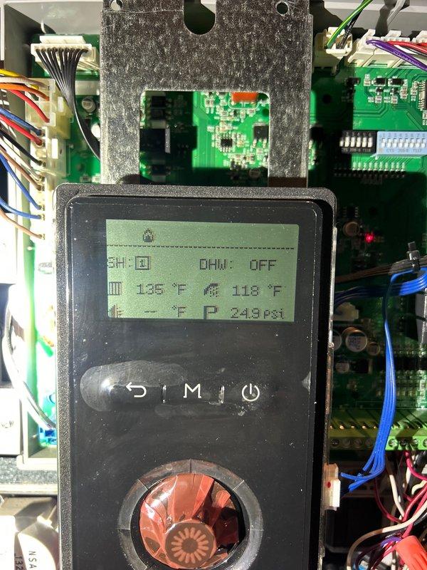 Performed warranty inspection on Combi-Boiler system, identifying faulty flat plate and pressure sensor (system displaying 243 psi). Documented control panel condition with photos and confirmed replacement parts are en route. Customer informed that warranty service will be scheduled upon parts arrival.