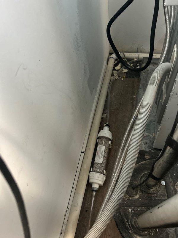 Responded to service call for a 3-year-old tankless water heater not producing hot water. Diagnosed scale buildup in the heat exchanger causing reduced flow and thermal efficiency. Performed descaling procedure using vinegar solution, cleaned inlet filter, and verified proper operation of temperature sensors. System now functioning correctly with consistent hot water output and normal operating parameters.