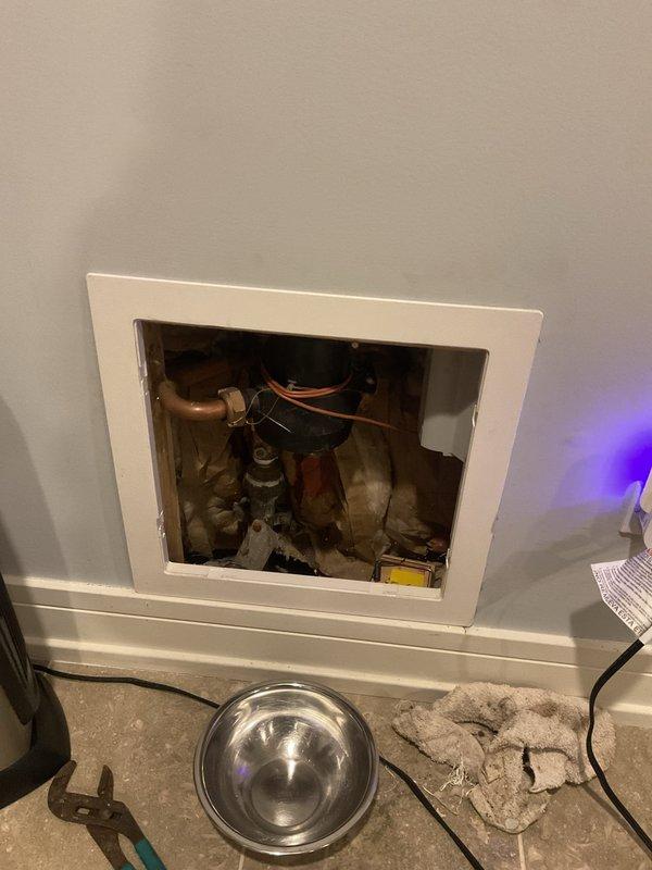 Responded to emergency call for complete water outage due to frozen main water line. Accessed plumbing compartment to inspect system components and identified frozen pipe sections. Used metal detector to trace pipe pathway behind walls. Left site after assessment, scheduling return visit with necessary equipment to thaw pipes and restore water service.