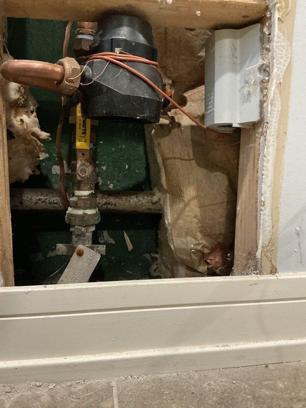 Responded to emergency call for complete water outage due to frozen main water line. Accessed plumbing compartment to inspect system components and identified frozen pipe sections. Used metal detector to trace pipe pathway behind walls. Left site after assessment, scheduling return visit with necessary equipment to thaw pipes and restore water service.