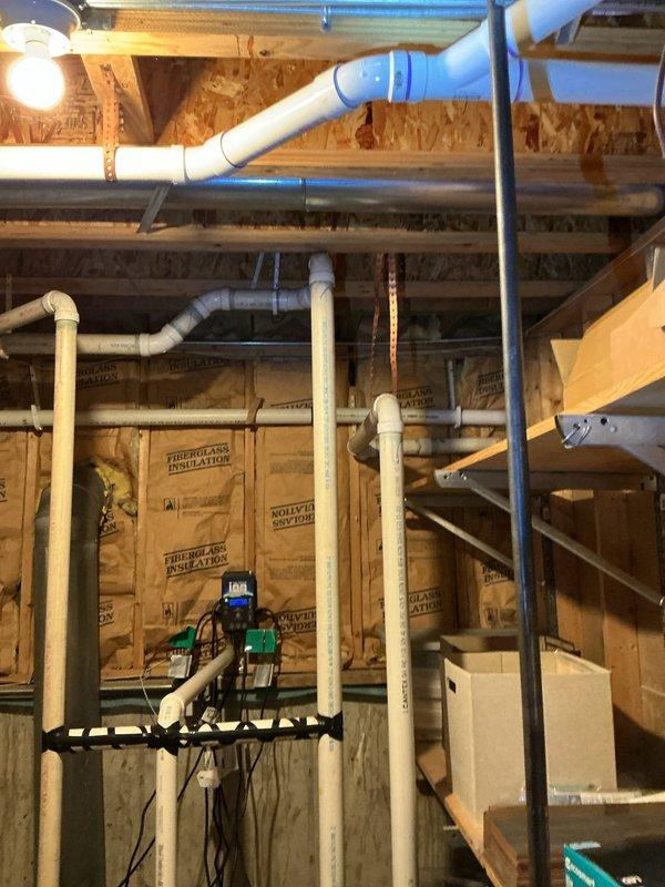 Responded to service call for dishwasher not draining and backing up into sink. Inspected basement plumbing system including copper drain lines and PVC piping. Cleared blockage in the drain line, restoring proper drainage function to both dishwasher and sink.