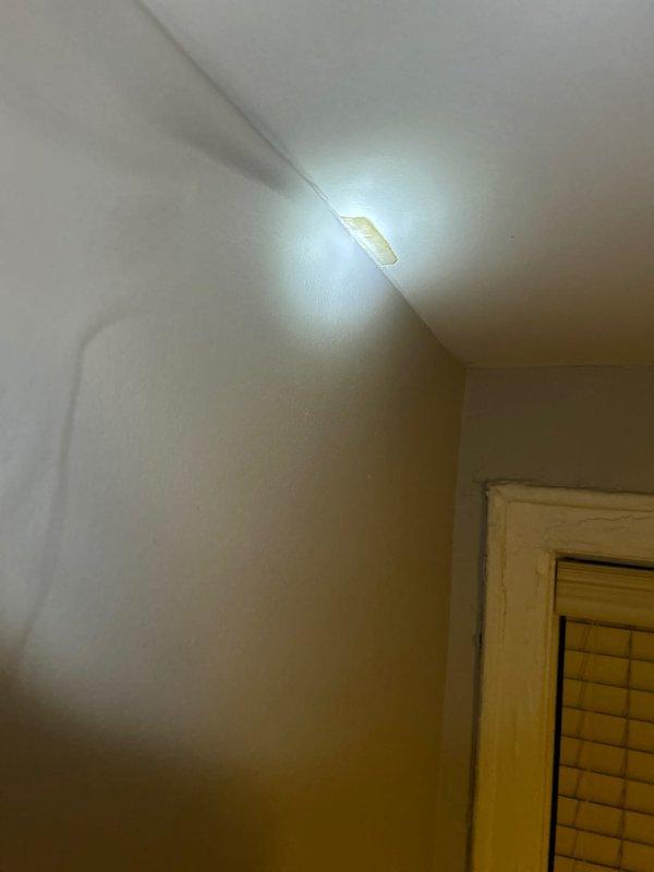 Responded to emergency call for ceiling leak. Upon inspection, identified a burst pipe above the ceiling causing significant water damage with a section of drywall already collapsed. Accessed the damaged area, isolated water supply, replaced the compromised pipe section, and performed leak testing to confirm proper repair.