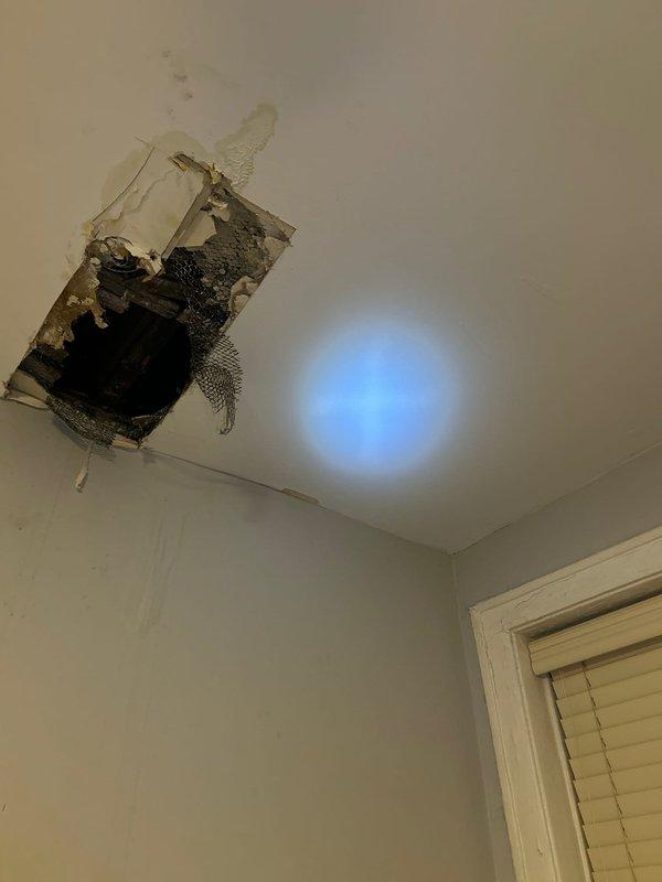 Responded to emergency call for ceiling leak. Upon inspection, identified a burst pipe above the ceiling causing significant water damage with a section of drywall already collapsed. Accessed the damaged area, isolated water supply, replaced the compromised pipe section, and performed leak testing to confirm proper repair.