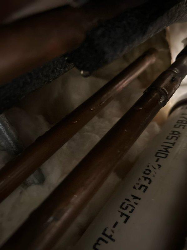 Responded to emergency call for burst pipes. Upon inspection, identified aging copper pipes with significant corrosion at threaded connection points. Replaced damaged section of copper piping and installed new fittings to restore water service and prevent future leaks.