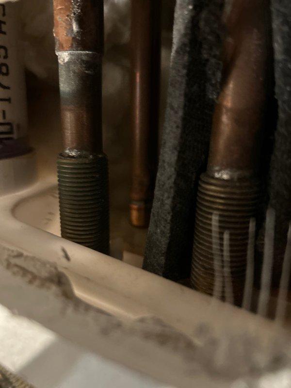 Responded to emergency call for burst pipes. Upon inspection, identified aging copper pipes with significant corrosion at threaded connection points. Replaced damaged section of copper piping and installed new fittings to restore water service and prevent future leaks.