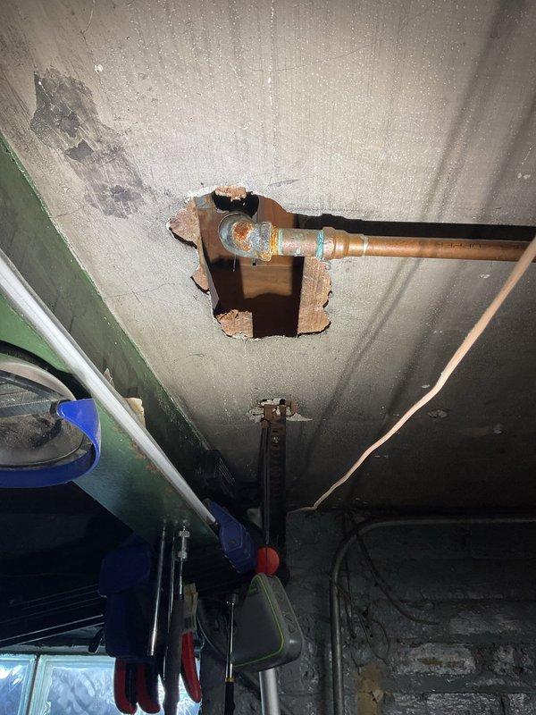 Responded to customer call regarding a leaking copper pipe previously installed. Inspection revealed water damage to ceiling requiring access holes to be cut for proper assessment. Identified faulty ProPress fittings at connection points of the horizontal copper line. Warranty status was evaluated as requested by customer.
