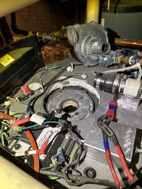 Completed diagnostic inspection on HVAC system with focus on the pressure monometer as requested by customer. Identified signs of corrosion on internal components and documented condition of blower assembly and electrical connections. Advised customer to contact Rheem manufacturer regarding warranty coverage and necessary replacement parts.