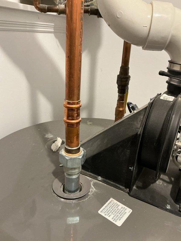 Inspected and diagnosed power-vented water heater system showing reduced heating performance. Evaluated blower motor assembly and checked copper piping connections for proper function. Recommended standard flush procedure to remove sediment buildup affecting heating efficiency. Additionally, performed inspection of upstairs toilet as requested by homeowner.