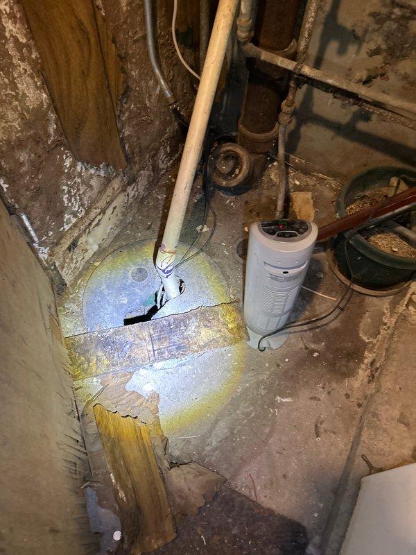 Responded to customer's request for frozen pipe service. Inspected basement area where multiple pipes showed signs of freezing and moisture damage. Located compromised pipe sections, thawed using professional equipment, and applied proper insulation to prevent future freezing. Observed water damage on concrete floor indicating previous pipe failure. Provided recommendations for additional insulation at vulnerable points and proper winterization procedures.