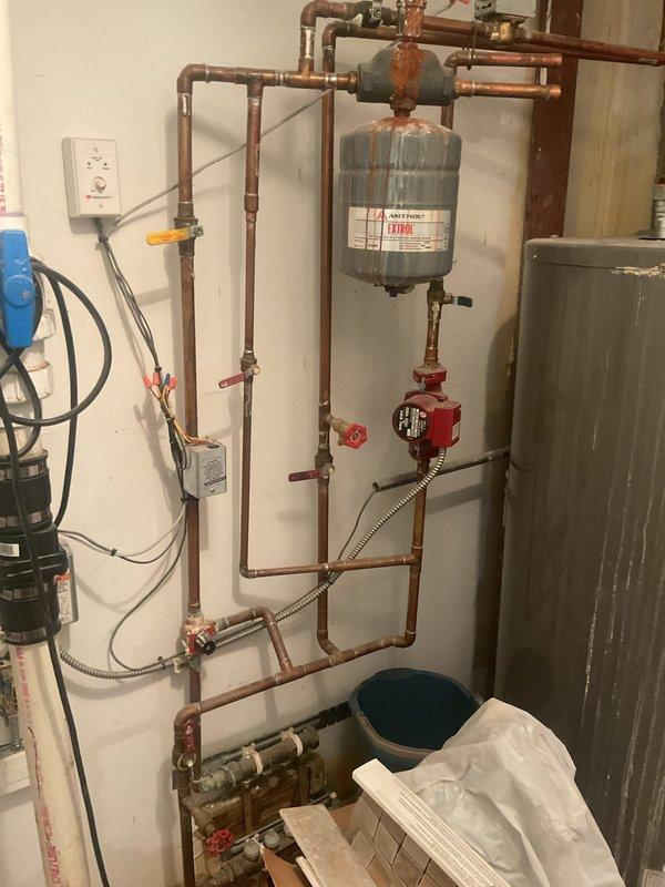 Performed inspection of Rheem water heater system showing signs of a loosening gasket and mineral deposits streaking down tank sides. Discussed VIP membership options (1-year and 3-year plans) with customer as alternative to their current 5-year renewal. Provided comprehensive estimate for future water heater replacement as requested.