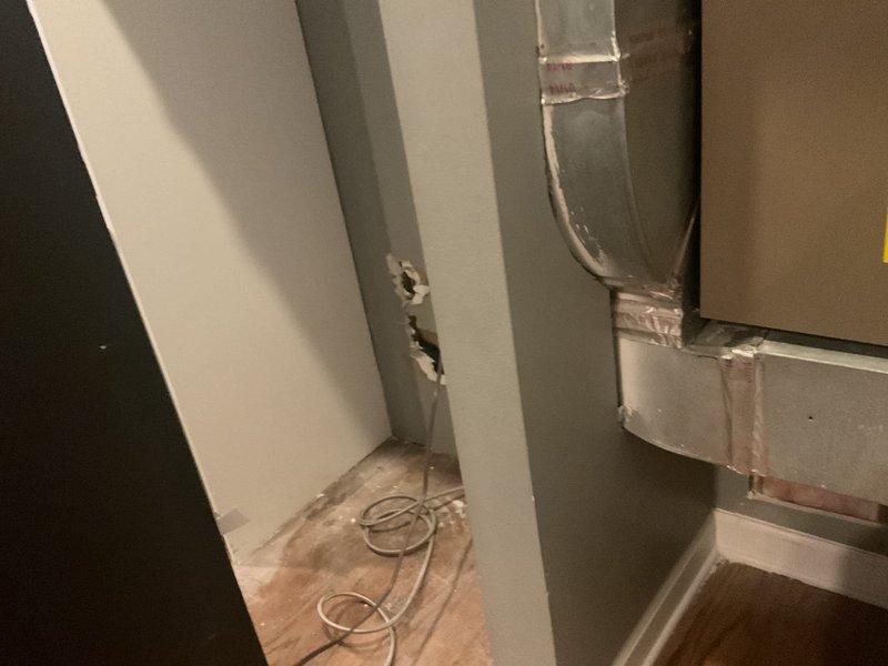 Performed assessment for potential kitchen sink water line rerouting. Observed damaged drywall section requiring repair before plumbing work can proceed. Evaluated existing HVAC proximity and utility closet configuration to determine optimal path for new water lines.