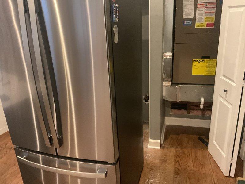 Performed assessment for potential kitchen sink water line rerouting. Observed damaged drywall section requiring repair before plumbing work can proceed. Evaluated existing HVAC proximity and utility closet configuration to determine optimal path for new water lines.