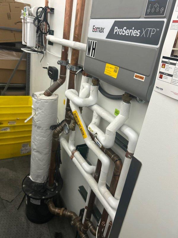 Responded to emergency service call for sump pump alarm activation. Inspected Eemax ProSeries XTP water heating system and associated plumbing infrastructure. Identified and resolved issue with the sump pump alarm system that had been active since previous day.