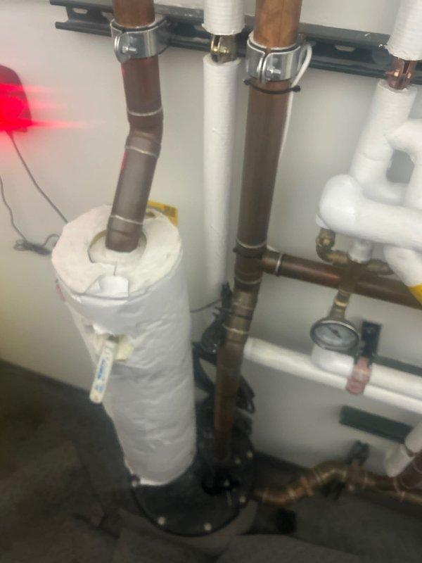 Responded to emergency service call for sump pump alarm activation. Inspected Eemax ProSeries XTP water heating system and associated plumbing infrastructure. Identified and resolved issue with the sump pump alarm system that had been active since previous day.
