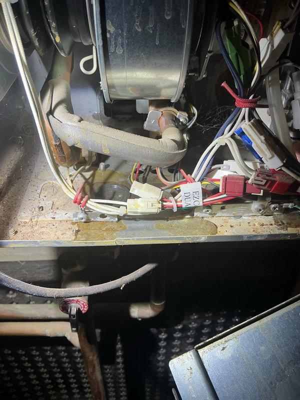 Responded to no hot water complaint for tanked water heater system. Upon inspection, found internal wiring and connection issues in the control compartment. Replaced damaged electrical components and restored proper operation of heating elements. System now functioning correctly with hot water production verified before departure.