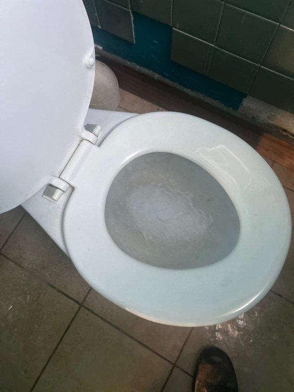 Responded to emergency call regarding frozen and burst pipes reported by neighbor with active leaking. Upon arrival, inspected bathroom fixtures including shower control unit and toilet. Restored water supply, repaired damaged pipe sections, and verified proper operation of all plumbing fixtures. Ensured no residual leakage before completing service.