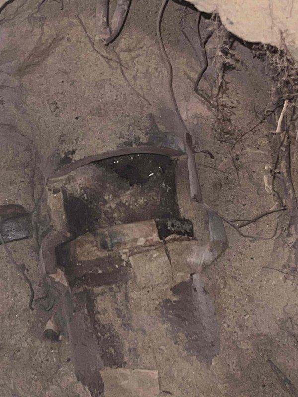 Excavated damaged area and installed new PVC drainage pipe with proper gravel bedding. Existing structure showed significant deterioration with extensive cracking, requiring complete removal and replacement of the affected section.