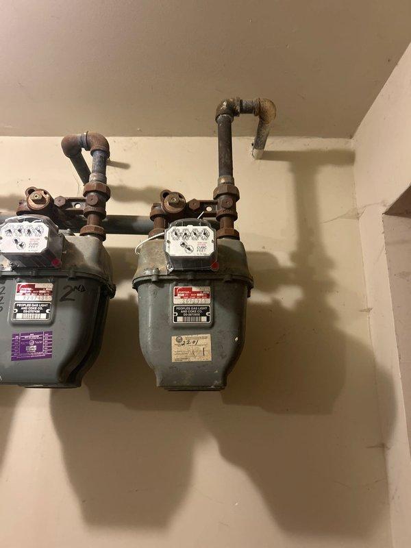 Responded to service call to cap off a gas line in customer's basement. Inspected existing gas meter installation and associated piping. Successfully installed a gas shutoff valve on the target line, securing the system and ensuring no gas leakage. Wall repair around the installation area was initiated but remains in progress.