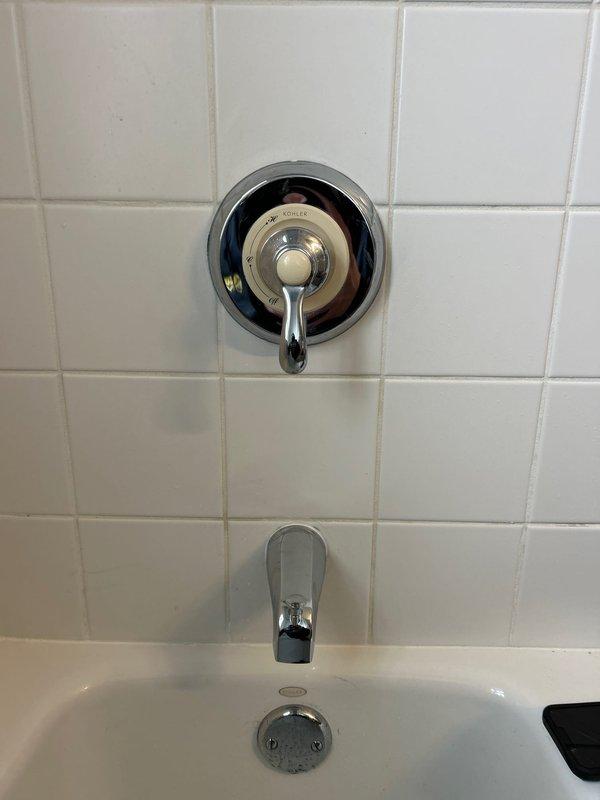 Successfully installed shower valve assembly and tub spout in tiled bathroom wall. Completed proper connection of water lines to valve body and verified functionality of control lever. Ensured watertight seal at fixture mounting points with clean finished appearance.