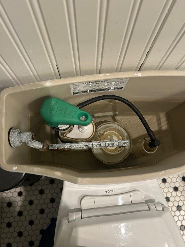 Responded to VIP maintenance call for circulation pump issues causing delayed hot water and noise. Upon inspection, found mineral deposits in the toilet tank components affecting proper water flow. Cleaned valve assembly and float mechanism to restore proper function. Completed 5-year membership service as requested.