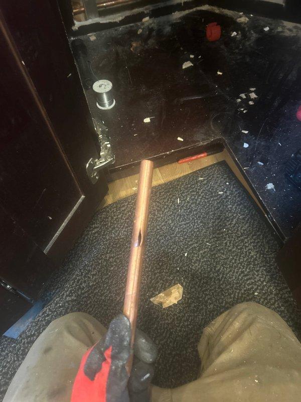 Responded to emergency call from Silver VIP member regarding a burst copper pipe. Upon inspection, identified the compromised section within the wall cavity where insulation had been damaged by water. Removed the damaged pipe segment, installed new copper pipe with appropriate coupling, and verified system integrity with pressure testing.