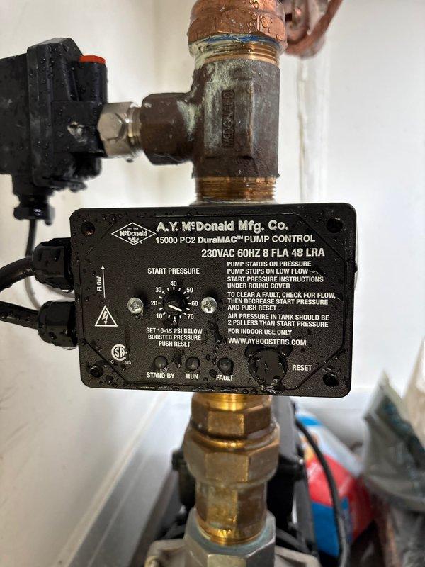 Responded to emergency basement flooding call. Installed A.Y. McDonald 15000 PC2 DuraMAC pump control system with 230VAC operational capacity to manage water removal and prevent future flooding. Added brass pressure regulator valve to maintain optimal system pressure and protect plumbing infrastructure from pressure fluctuations.