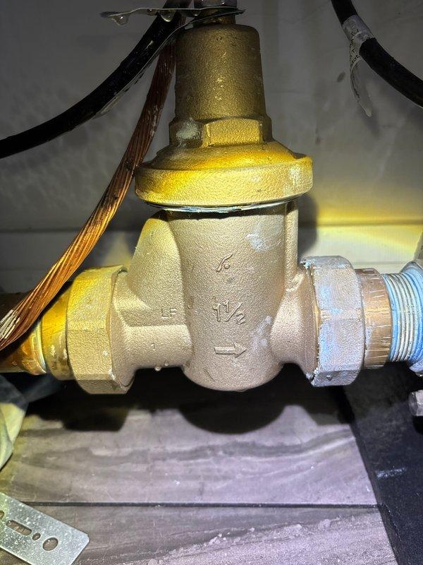 Responded to emergency basement flooding call. Installed A.Y. McDonald 15000 PC2 DuraMAC pump control system with 230VAC operational capacity to manage water removal and prevent future flooding. Added brass pressure regulator valve to maintain optimal system pressure and protect plumbing infrastructure from pressure fluctuations.