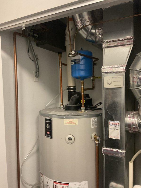 Completed installation of a replacement 75-gallon water heater in utility closet as requested by customer. Installed new expansion tank with proper copper pipe connections and verified all components are functioning correctly. System includes proper valving and meets all code requirements with no leaks observed upon final inspection.
