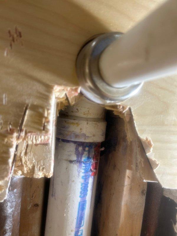 Responded to a water leak complaint involving ceiling damage in bedroom caused by unit above. Upon inspection, identified signs of water intrusion along baseboard/wall junction with visible deterioration. Further investigation revealed improper plumbing connections between PVC and metal fittings in the wall cavity of the upstairs unit, with evidence of ongoing leakage causing damage to the wooden structure. Leak source was located, documented with photos, and repair recommendations provided to both unit owners.