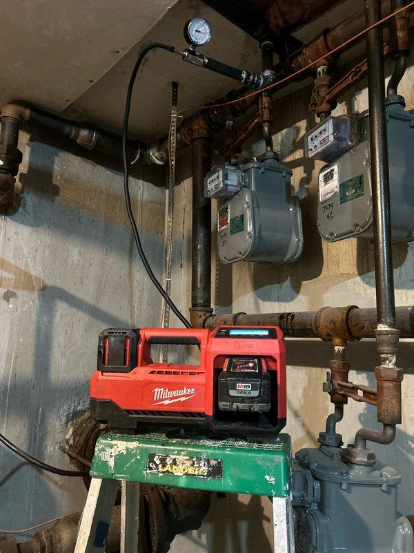 Completed furnace system repair/installation in confined utility space. Inspected gas lines, pressure gauges, and metering equipment to ensure proper functionality. Verified down payment as per job sold by Basi and documented installation with photos showing completed work.