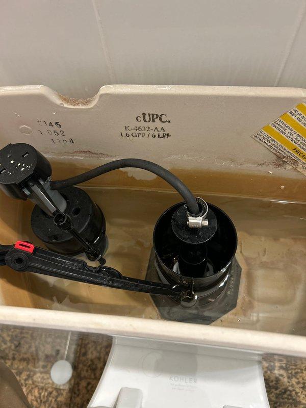 Responded to service call for toilet with malfunctioning flush mechanism. Upon inspection of tank interior, identified loose connection between flush valve assembly and chain. Repaired and secured the flushing components, adjusted water level, and verified proper operation. Unit now functioning correctly.