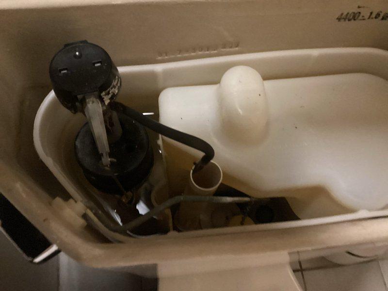 Responded to a residential service call for a non-flushing toilet with no water running. Upon inspection, found issues with the fill valve assembly and flush mechanism inside the tank (model #400-168). Replaced the malfunctioning components, adjusted the water supply line connection, and verified proper water flow. Toilet now functioning correctly with complete flush cycle and appropriate tank refill.