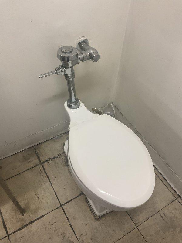 Responded to service call for commercial toilet with reported flow issues. Upon inspection, found toilet had malfunctioning flush valve affecting proper water flow. Serviced the flush valve mechanism, adjusting the pressure regulator and cleaning mineral deposits from valve components. Tested functionality after repair with multiple flush cycles to confirm proper operation and water flow has been restored.