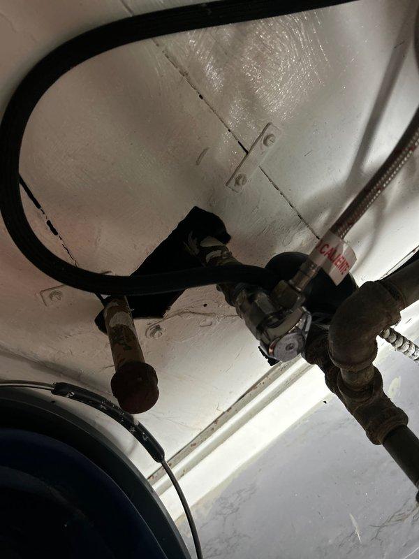 Responded to a rescheduled priority service call for kitchen sink leak. Upon inspection, identified corrosion on copper supply lines and failing valve assembly. Replaced damaged sections of piping, installed new braided supply lines, and replaced valve assembly to resolve the leak issue.