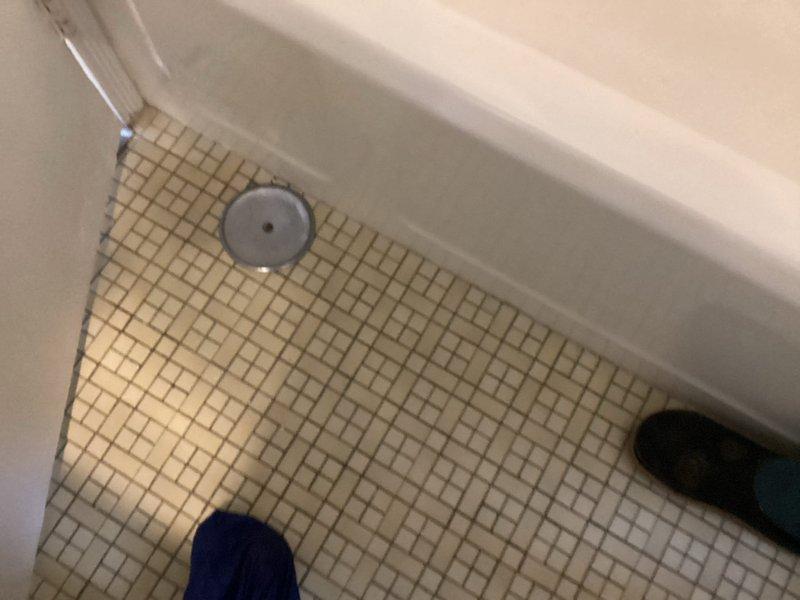 Responded to service call for bathroom plumbing issues. Inspected toilet flush valve assembly which showed normal operation with no visible leaks or damage. Examined bathroom floor drain in shower area which exhibited signs of clogging as reported by customer. Completed necessary repairs to resolve reported issues with bathroom sink faucet leak, shower drain clog, and toilet handle.