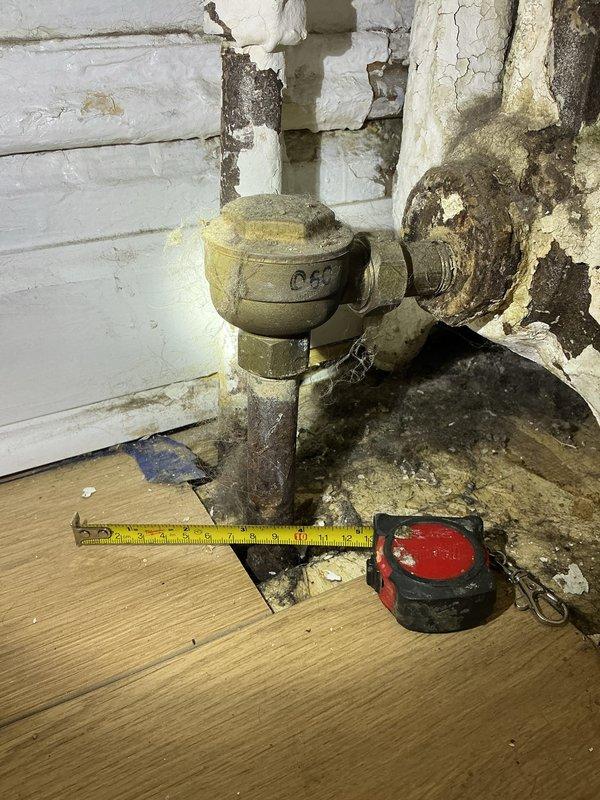 Responded to priority rescheduled service call to address severely deteriorated plumbing fixture. Upon inspection, found significant corrosion and water damage on wall-mounted valve assembly with compromised pipe connections. Replaced damaged valve fixture and restored proper functionality to the system.