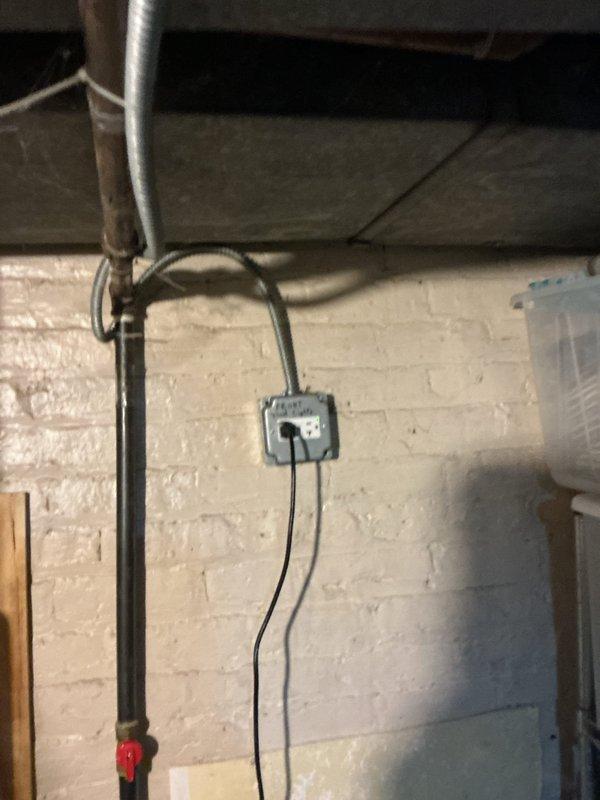 Responded to emergency service call for recently installed Navien water heater that had stopped functioning. Upon inspection, verified proper electrical connections at junction box and confirmed unit was receiving power. Reset control panel and restored normal operation, with temperature successfully maintaining at 128°F. All plumbing connections were checked for leaks and found to be secure.