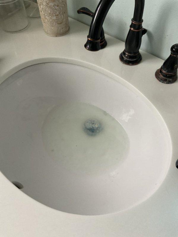 Responded to service call for completely backed up bathroom sink that began the previous day. Upon arrival, observed standing water in the sink basin with minor debris. Successfully cleared the clogged drain using professional snaking equipment, restoring proper drainage function. Completed final testing to confirm full water flow and proper drain operation.