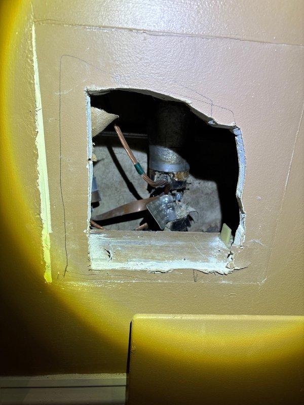 Responded to emergency service call for frozen pipes causing water seepage in basement and lack of water service. Accessed plumbing system through wall cavity to inspect copper pipes and identified frozen section in basement near foundation wall. Thawed affected pipes and restored water flow, confirming proper operation of the system before completion.