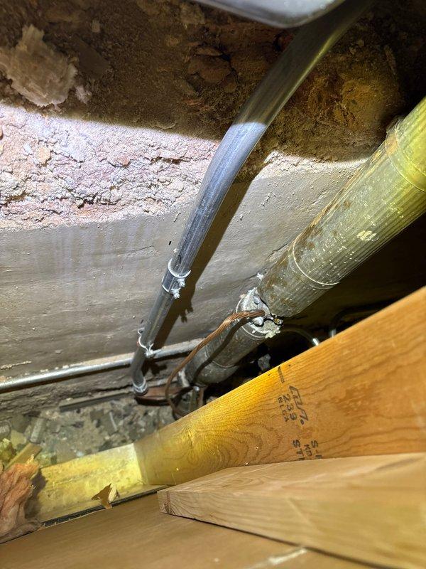 Responded to emergency service call for frozen pipes causing water seepage in basement and lack of water service. Accessed plumbing system through wall cavity to inspect copper pipes and identified frozen section in basement near foundation wall. Thawed affected pipes and restored water flow, confirming proper operation of the system before completion.