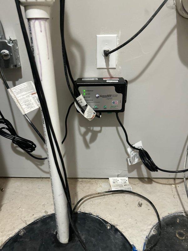 Diagnosed and repaired a sump pump system with recurring alarm issue despite recent battery replacement. Identified faulty control module as the cause of false alarms and replaced it, ensuring proper communication between the battery backup system and primary pump. System now functioning correctly with no alarm conditions.
