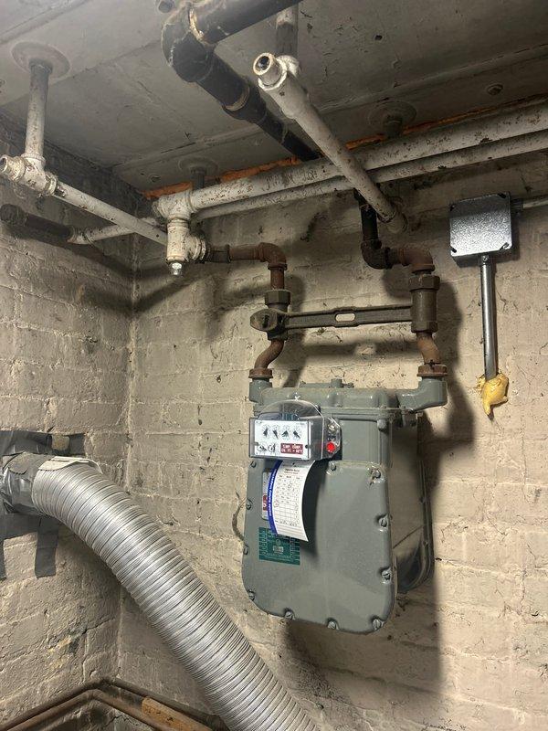 Conducted warranty service visit to inspect and address previously installed gas line. Examined gas meter and associated black iron piping for proper installation and functionality. Evaluated water heater connections and control valve assembly, including the flexible gas connector. Further remediation required as warranty work is still pending completion.