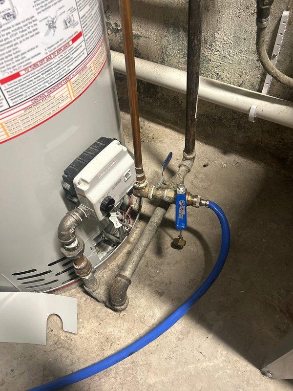 Conducted warranty service visit to inspect and address previously installed gas line. Examined gas meter and associated black iron piping for proper installation and functionality. Evaluated water heater connections and control valve assembly, including the flexible gas connector. Further remediation required as warranty work is still pending completion.