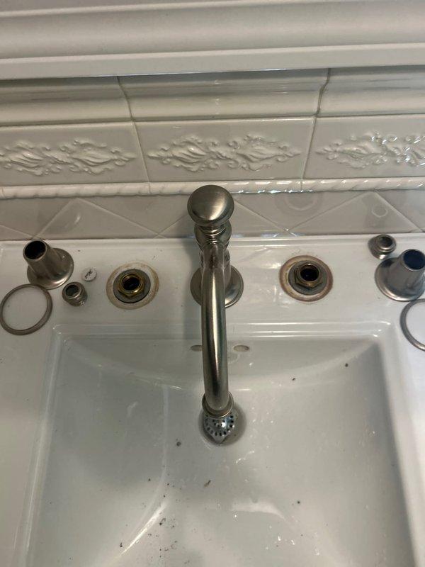Located and repaired two minor leaks - one in the powder room sink involving the faucet assembly and drain connections, and another in the kitchen faucet. Disassembled, inspected, and reassembled the bathroom fixture components to ensure proper sealing and function.